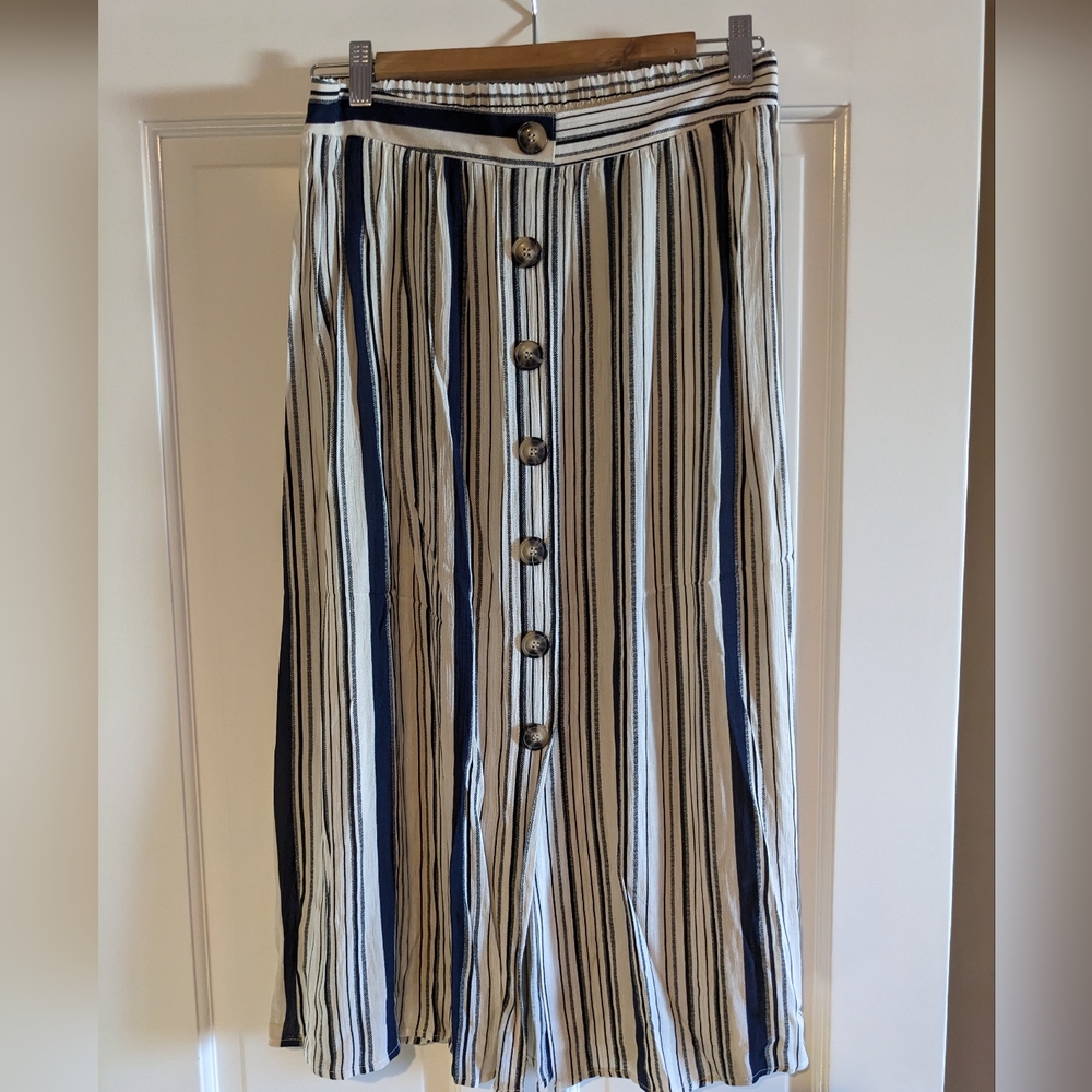 Women's striped skirt by BCC in a size medium with buttons down front.
